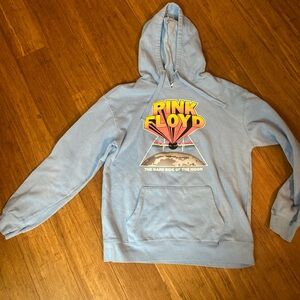 Pink Floyd Blue Hoodie with Vibrant Graphic
The dark side of the moon collection